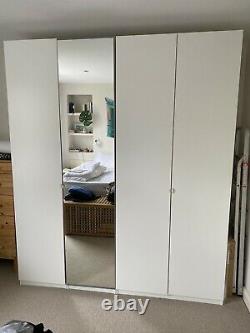 Ikea four door large wardrobe with rails, shelves, drawers, full length mirror