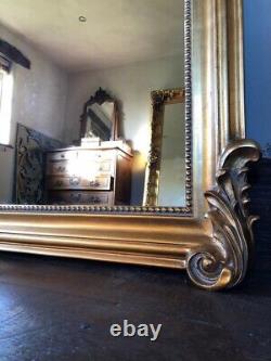 Grand miroir à pied doré antique français orné de motifs, taille pleine, en arc, de 6 pieds