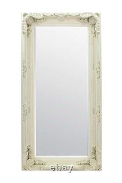 Grand miroir crème de style Louis ancien et orné, en longueur totale, mural, mesurant 5 pieds 9 pouces sur 2 pieds 11 pouces.
