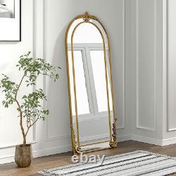 Grand miroir de sol incliné mural de longueur totale en or richement orné avec arc, mesurant 180 cm x 80 cm.