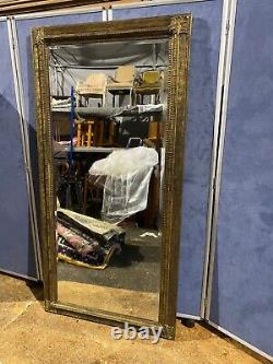 Grand miroir en verre biseauté doré à effet antiquaire moderne