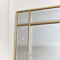 Grand miroir mural Art Déco avec cadre doré en grand format, long et mince, de forme rectangulaire