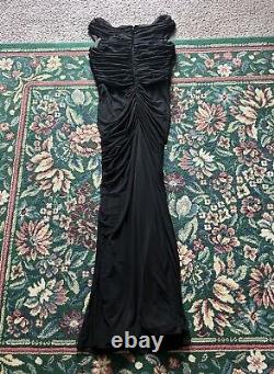 Robe Tadashi Shoji en maille noire grande taille avec superposition froncée et queue de poisson à longueur totale extensible.